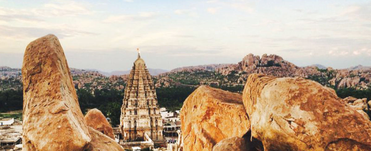 View of Hampi, India through a rock formation.